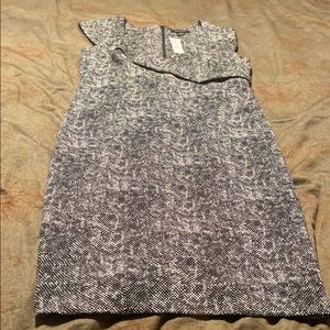 Sleeveless black and white winter power dress